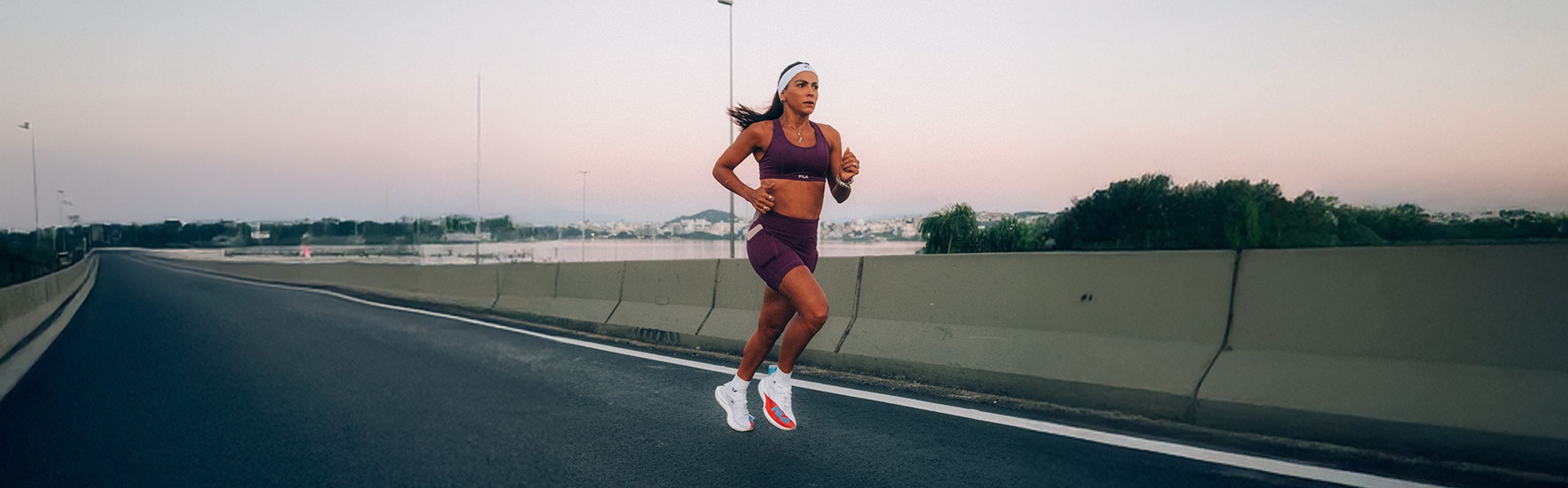Ana Augusta, triatleta amadora, com produtos Fila