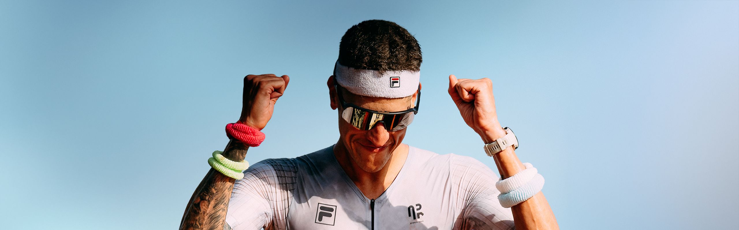 Luis Ohde, triatleta profissional, com produtos Fila